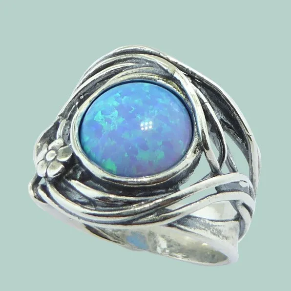 Bluenoemi sterling silver ring for woman. Israel ring. Set with a blue lab opal stone.