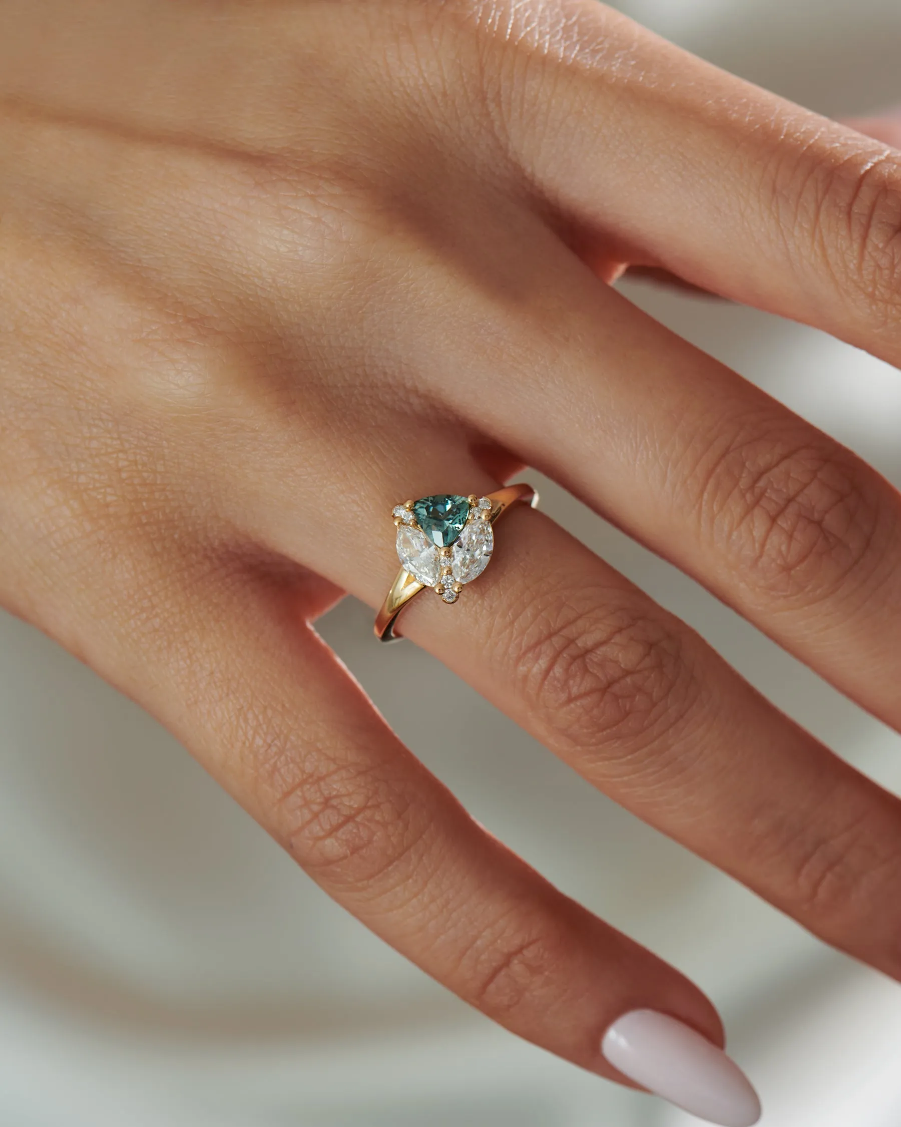 Serene Trillion Teal Sapphire and Marquise Diamond Engagement Ring